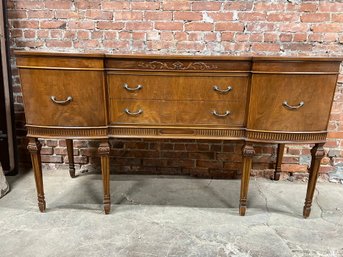 Vintage Buffet Sideboard With Decorative Carving And Queen Anne Style Pulls