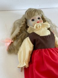 Porcelain And Cloth Doll