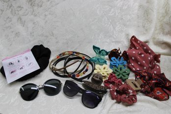 Assortment Of Hair Accessories And Sunglasses