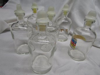 LOT OF LARGE PYREX APOTHECARY PHARMACY BOTTLES WITH LIDS