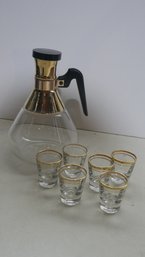 MCM GOLD INLAY GLASS CARAFE AND MATCHING SHOT GLASSEX