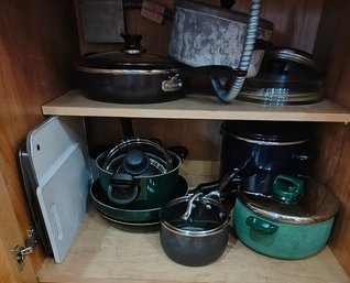 Cabinet Full Of Pots And Pans, Cutting Boards