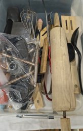 Tupperware Filled With Utensils