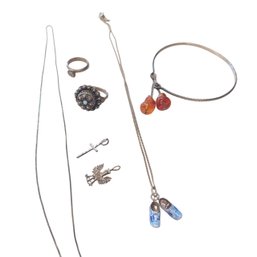 Silver Jewelry Lot: Necklaces (2), Rings (2) & Bracelet