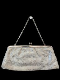Silver Fabric Clutch With A Metal Kiss-lock Frame And A Chain Strap.