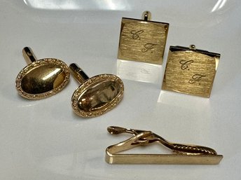 (2) Gold Tone Cuff Links And A Money Clip