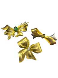 Three Gold Tone Bow Brooches