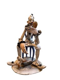 Ceramic Seated Clown With Dog Figurine