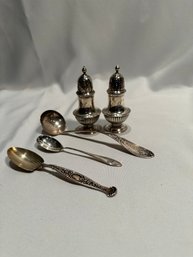 Salt And Pepper And Spoons