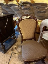 Carved Wood Upholstered Rocking Chair