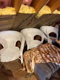 Three White Wicker Chairs