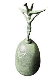 Man Holding Paper Crane Bell