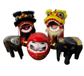 Wooden Elephants, Chinese Lion Bobbleheads & Lucky Daruma Doll (a)
