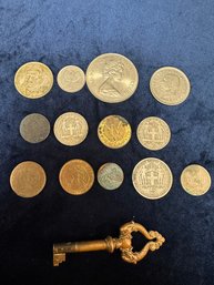 Foreign Coins And A Brass Key