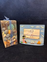 A Box Of Shells And A Picture Frame