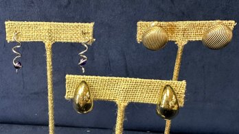 2 Pairs Of Clip On Earrings And A Pair Of Silver Earrings