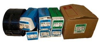 Shelf Full Of Blue Tempered Spring Shell Shims (WS)
