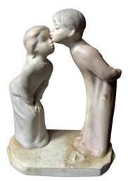 Boy & Girl Kissing Figurine