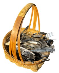 Wicker Basket Full Of Assorted Silverware