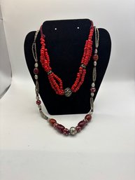 2  Silver Tone And Beaded Necklaces