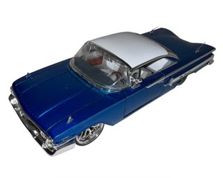 1960 Chevrolet Impala Blue Diecast Model Car (H)
