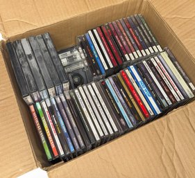 Box Full Of Assorted CDs, DVDs & Cassettes
