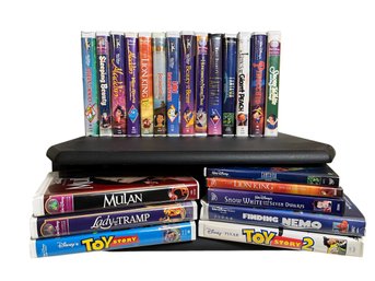 Disney VHS Tapes/DVDs & Swivel TV Screen Stand (L)