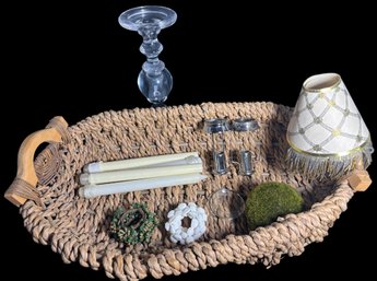 Assortment Of Candles, Decor, And Basket