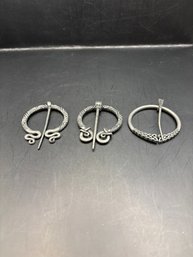 3 Penannular Brooches