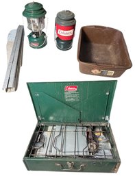 Coleman Grill With High Stand, Coleman Lanterns, And Brown Rubbermaid Bucket (s)