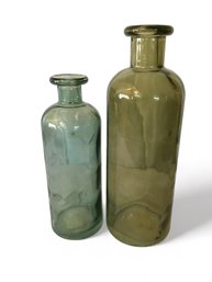 Two West Elm Decorative Glass Bottles