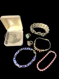 8 Pieces Of Costume Jewelry