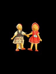 Two Small Wooden Dolls