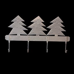Black, Wrought Iron Coat Rack With Decorative Trees.