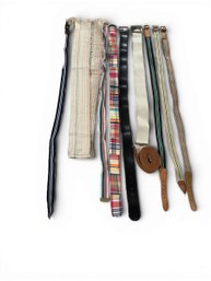 9 Belts And A Luggage Strap