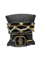 3 Bracelets, 1 Stella & Dot Resilience, 1 Tri Colored Mesh W/ Magnetic Closure And 1 Hamsa Hand Charm