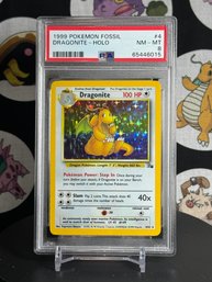 PSA 8 1999 POKEMON FOSSIL DRAGONITE-HOLO