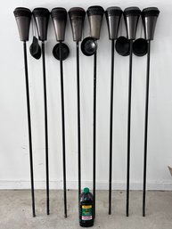Set Of 8 Tiki Torches And Fuel (lot 1)