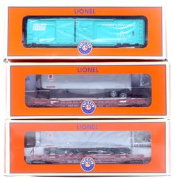 3 Lionel Train Cars. Box Car, Flatbed.