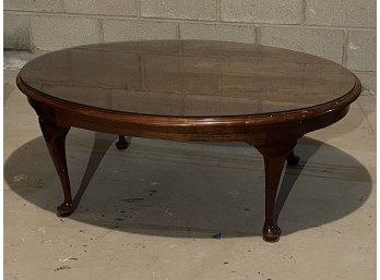 Oval Cherry Coffee Table.   44L X 33W X 18H