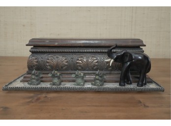 Elephant-Themed Shelf With Carved Box And Figurines