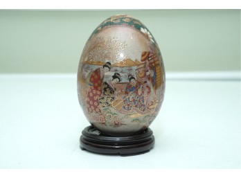 Intricately Painted Asian Decorative Egg On Wooden Stand