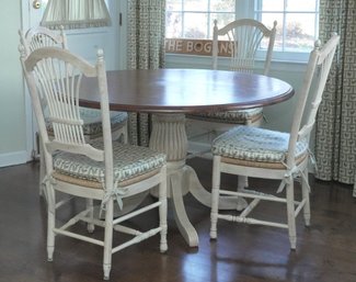 Distressed Pedestal Dining Table With Four Chairs And Cushions