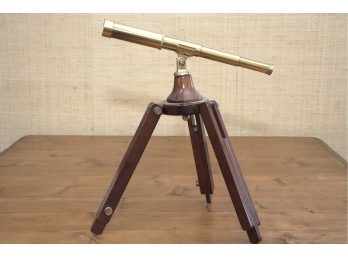 Decorative Brass Telescope On Dark Wood Tripod Stand