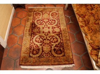 Red And Gold Floral Pattern Area Rug With Fringe