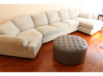 Light Beige Sectional Sofa With Chaise And Grey Tufted Ottoman