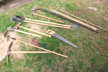 Assorted Yard And Garden Tools Including Rakes, Shovels, And Axes
