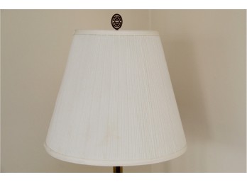 A Brass And Round Glass Shelf Lamp Table