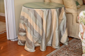 Round Skirted Side Table With A Glass Top.