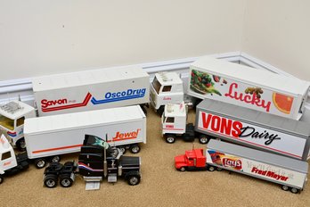 Collection Of Vintage Toy Semi-trucks And Trailers